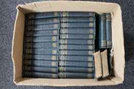 A box containing twenty-six pocket volumes,