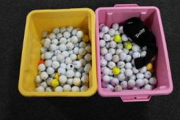 Two crates of golf balls