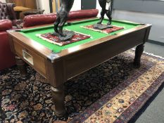A contemporary Monarch pool/snooker table, in wood veneer finish,