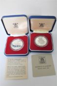 Two cased silver crowns,