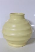 A Wedgwood Keith Murray design bulbous ribbed vase, matt straw, height 18.