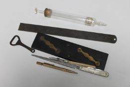 A small quantity of antique drawing instruments, glass syringe,