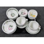 A tray containing sixteen Portmeirion bowls together with two oversized Portmeirion teacups with