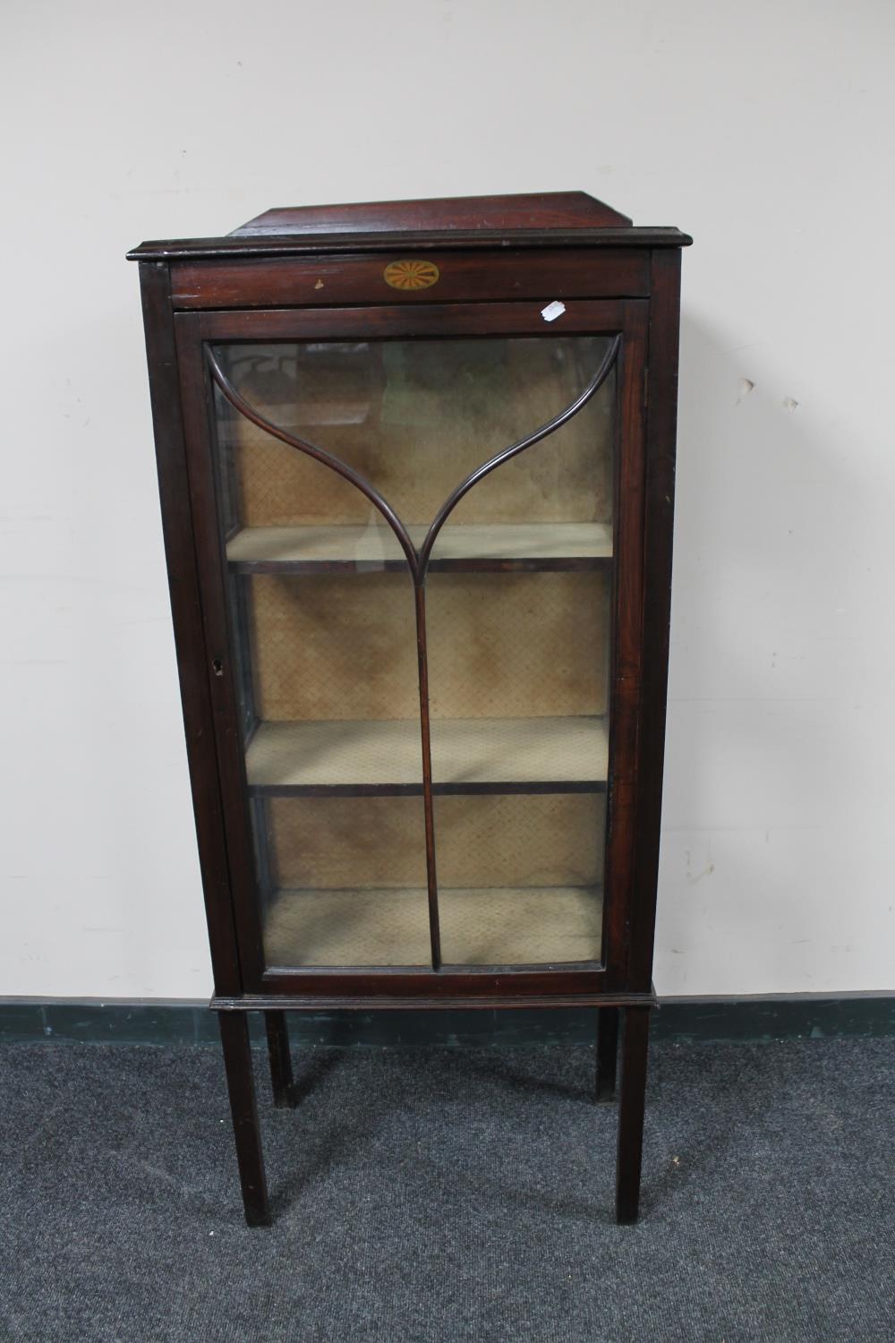 A Victorian inlaid mahogany display cabinet