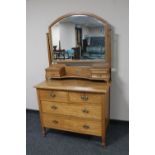 An oak Arts and Crafts dressing chest