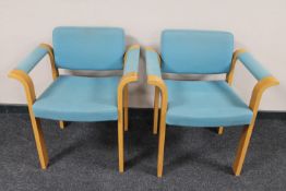 A pair of 20th century Danish Magnus Olesen design armchairs