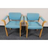 A pair of 20th century Danish Magnus Olesen design armchairs