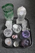 A tray of assorted glass ware including a glass mantel clock case, paperweights, preserve pots,