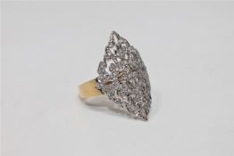 An 18ct gold diamond panel ring