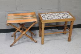 A blonde oak tiled topped side table and a mid 20th century folding stool