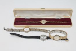 A lady's 9ct gold Garrard wristwatch on 9ct gold bracelet strap,