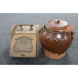 An antique glazed terracotta lidded pot and an Edwardian oak coal receiver