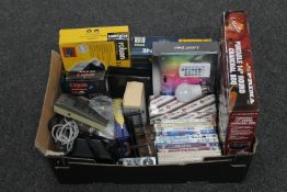 A box of assorted DVD's, Work Zone electric drill, magnifying visor,