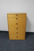 A 20th century teak six drawer chest