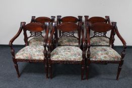 A set of six Victorian style armchairs upholstered in floral tapestry fabric