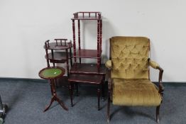 A mahogany armchair upholstered in gold button dralon, two telephone stands,