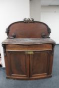 A Victorian mahogany serpentine fronted chiffonier