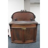 A Victorian mahogany serpentine fronted chiffonier