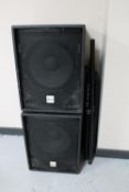 A pair of Alto Professional TS Sub true sonic PA speakers with stands
