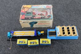 A boxed Matchbox Big MX mechanised tractor plant and winch transporter