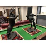 A pair of bronze figures - boxing hares,