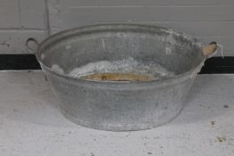 A galvanized wash tub