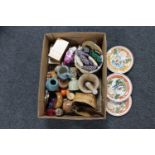 A box containing a Coalport figure, Wedgwood Christmas plates, studio pottery,