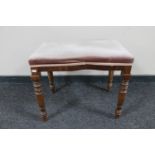 A Victorian mahogany dressing table stool