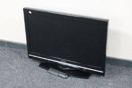 A Toshiba 32 inch LCD TV with remote