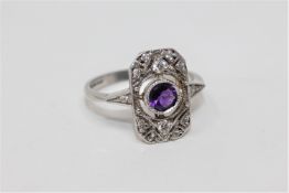 A 9ct gold amethyst and diamond ring