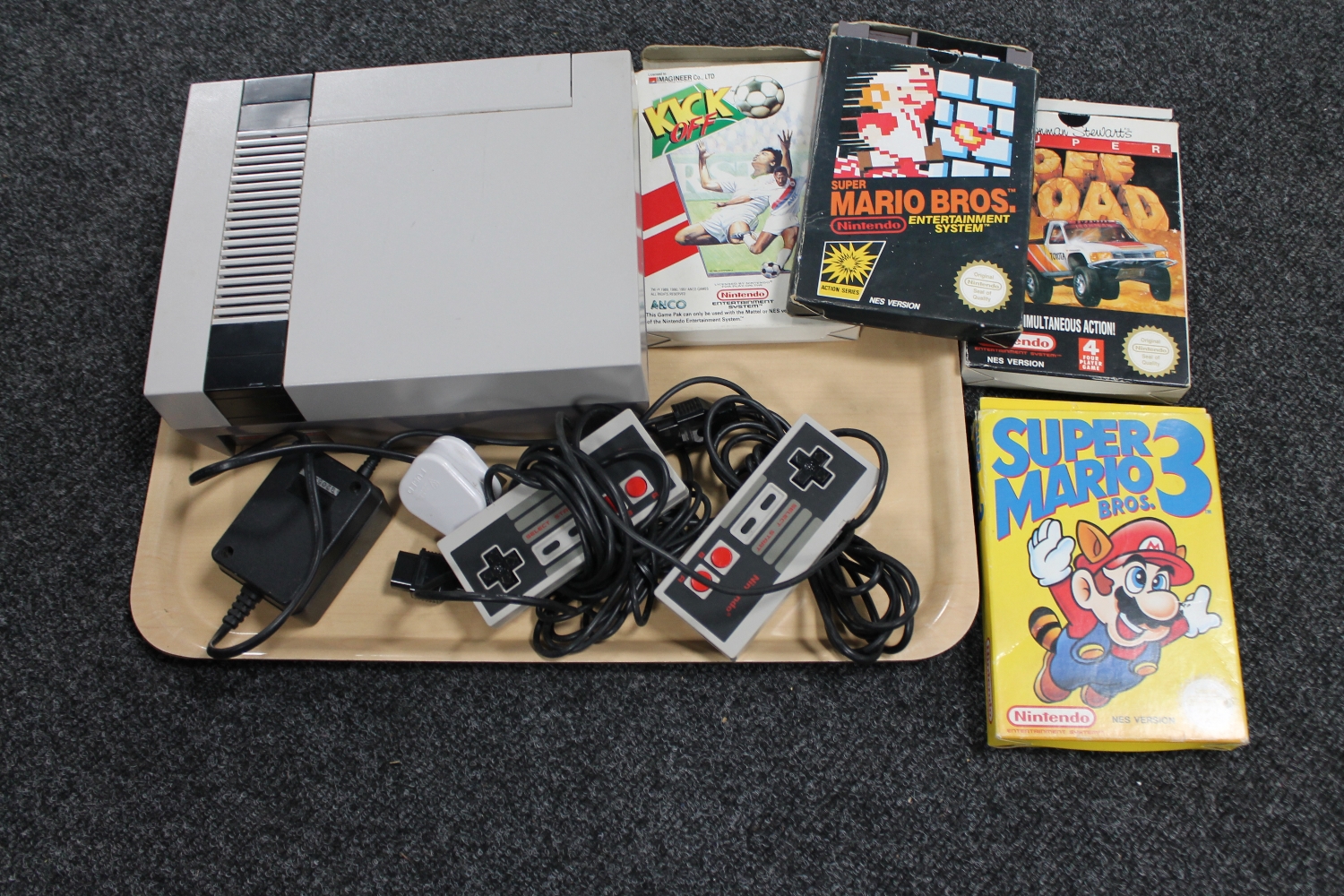 A Nintendo entertainment system with two controllers,