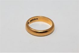 A 22ct gold band ring CONDITION REPORT: 6.