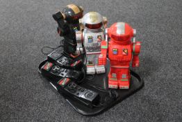 Three 1980's battery operated Torque-a-tron robots with hand sets