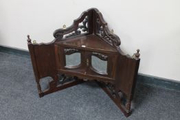 A Victorian mahogany double door corner shelf