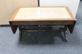 A mahogany flap sided leather inset sofa table