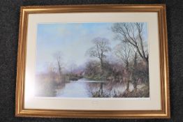 A gilt framed signed print,