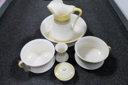 A four piece antique pottery wash set and two chamber pots