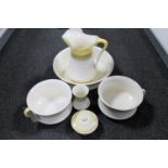 A four piece antique pottery wash set and two chamber pots