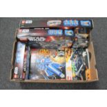 A box of six boxed Lego Star Wars sets - 75140, 75147, 75138, 75087,