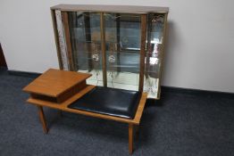 A mid 20th century Formica double door display cabinet and a teak telephone table