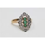 A 9ct gold emerald and diamond ring