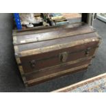 An early 20th century wooden bound travelling trunk