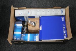 A box of LED light bulbs, converter fittings, two Oral B electric toothbrushes,