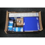 A box of LED light bulbs, converter fittings, two Oral B electric toothbrushes,