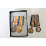 Two sets of miniature WWI medals on ribbons