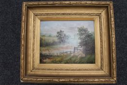 A gilt framed oil on board, sheep before a river, signed Alfonso Bardo,