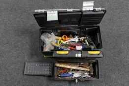 Two plastic tool boxes containing assorted hand tools together with a cased socket set