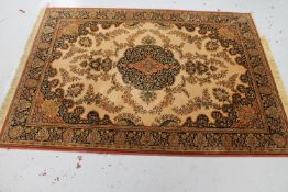 A machine made Persian style rug