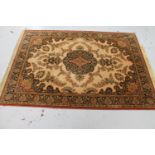 A machine made Persian style rug