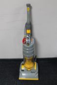 A Dyson DC 1 upright vacuum cleaner